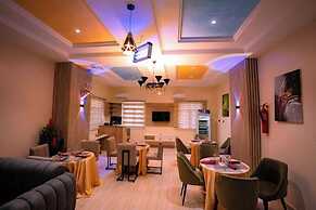 AJ'S HOTEL AND SUITES