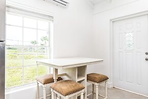 Tropical Bottle Creek Apts & Parking