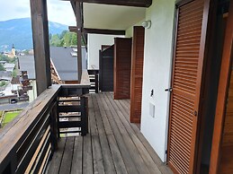 Apartment With Balcony and Mountain Views