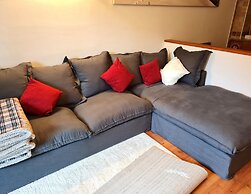 Apartment With Balcony and Mountain Views