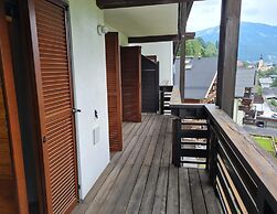 Apartment With Balcony and Mountain Views