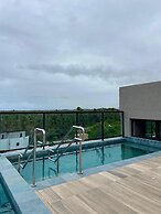 Flat a 120 metros das Piscinas Naturais