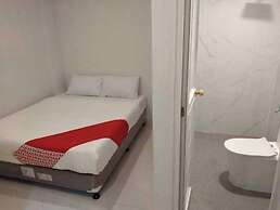 OYO 1128 W Sangco Building Leasing