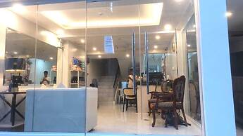 OYO 1128 W Sangco Building Leasing