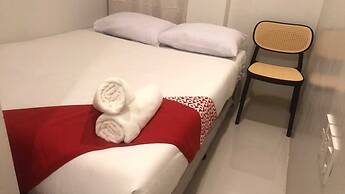 OYO 1128 W Sangco Building Leasing