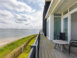 Lush Apartment With Water Views