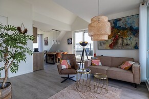 Lush Apartment With Water Views