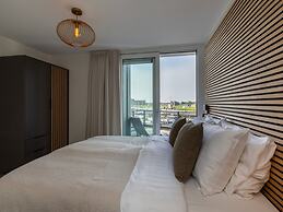 Lush Apartment With Water Views