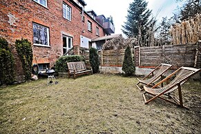 Secret Garden by Grand Apartments