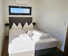 Mountains&Lakes – Chaletdorf & Apartments