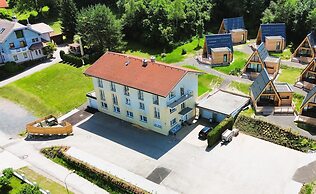 Mountains&Lakes – Chaletdorf & Apartments