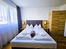 Mountains&Lakes – Chaletdorf & Apartments