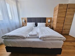 Mountains&Lakes – Chaletdorf & Apartments