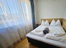 Mountains&Lakes – Chaletdorf & Apartments