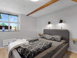 Coastal Charm: Cozy Holiday Home in Lokken