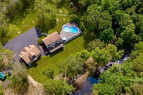 Family Fun Oasis Hot Tub Steam Room Pool Stream Firepit Games