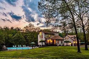 Family Fun Oasis Hot Tub Steam Room Pool Stream Firepit Games