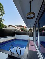 Greystone 4BHK Pvt Pool by Stellar Stays