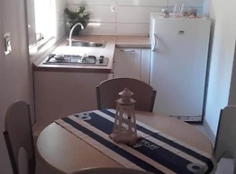 Cozy Robinson Crusoe-style House