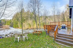 Pet-friendly Riverfront Cabin w/ Hot Tub