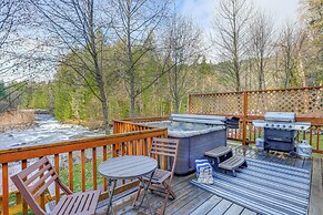 Pet-friendly Riverfront Cabin w/ Hot Tub
