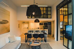 Luxe Loft Art and Elegance in the Heart of Palermo by BT Homes