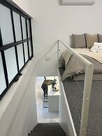 Luxe Loft Art and Elegance in the Heart of Palermo by BT Homes