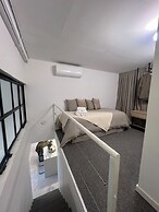 Luxe Loft Art and Elegance in the Heart of Palermo by BT Homes