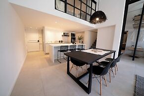 Luxe Loft Art and Elegance in the Heart of Palermo by BT Homes