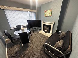 Housesleeps9-fireplace-garden-bbq-tv