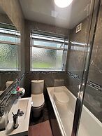 Housesleeps9-fireplace-garden-bbq-tv