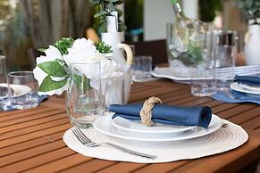 50% off New Waterfront Oasis Mins Beach, Eats, Shop