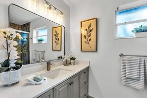 50% off New Waterfront Oasis Mins Beach, Eats, Shop