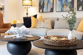 50% off New Waterfront Oasis Mins Beach, Eats, Shop