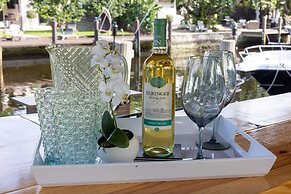 50% off New Waterfront Oasis Mins Beach, Eats, Shop