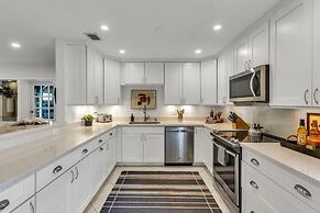 50% off New Waterfront Oasis Mins Beach, Eats, Shop