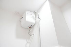 Homey and Minimalist 2BR at Podomoro Golf View Apartment