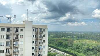 Homey and Minimalist 2BR at Podomoro Golf View Apartment