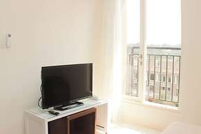 Nice and Comfort 1BR with Extra Room at Podomoro Golf View Apartment