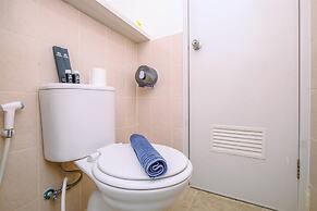 Warm and Cozy Design Studio at Podomoro Golf View Apartment