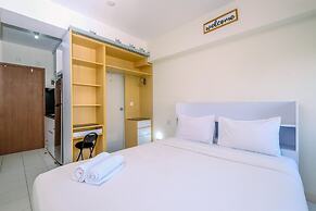 Warm and Cozy Design Studio at Podomoro Golf View Apartment