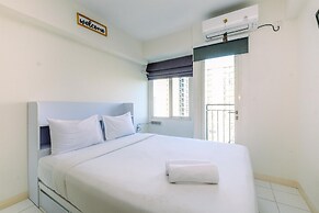 Warm and Cozy Design Studio at Podomoro Golf View Apartment