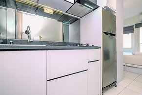 Warm and Cozy Design Studio at Podomoro Golf View Apartment