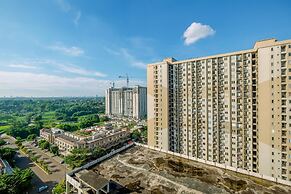 Warm and Cozy Design Studio at Podomoro Golf View Apartment