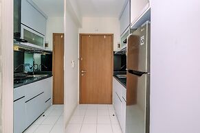 Warm and Cozy Design Studio at Podomoro Golf View Apartment