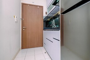 Warm and Cozy Design Studio at Podomoro Golf View Apartment