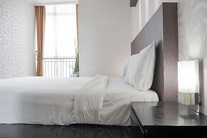 Elegant and Comfy 1BR with Extra Room Apartment at Bellagio Residence