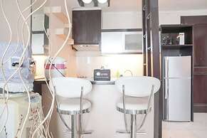 Elegant and Comfy 1BR with Extra Room Apartment at Bellagio Residence