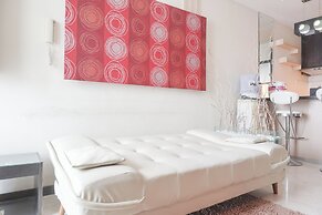 Elegant and Comfy 1BR with Extra Room Apartment at Bellagio Residence