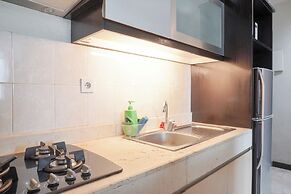 Elegant and Comfy 1BR with Extra Room Apartment at Bellagio Residence